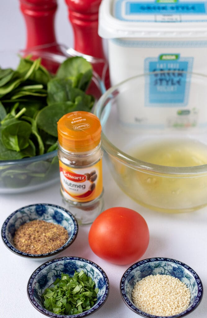 Ingredients to make healthy scrambled egg whites laid out on a table.
