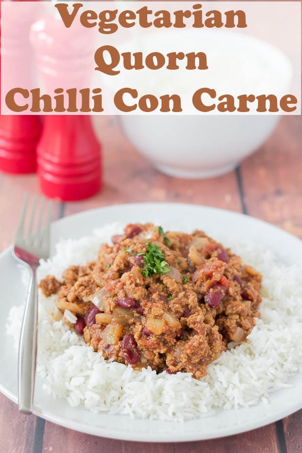 A plate vegetarian Quorn Chilli Con Carne served on a portion of rice. Title of the picture at the top.