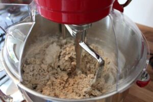 Mix with your hand in the large bowl until the dough is breadcrumb like. If using a stand mixer, use the mixing accessory.