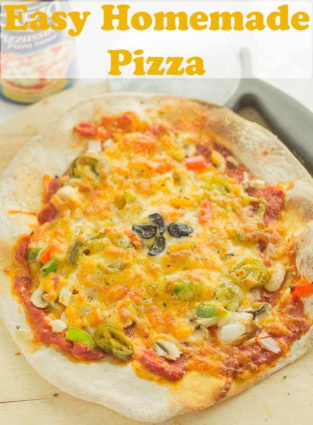 This delicious homemade pizza recipe is easy and fun to make. The dough is a thin pizza base and there's a selection of healthy toppings too. Plus it's far healthier than take out! #neilshealthymeals #recipe #homemade #pizza