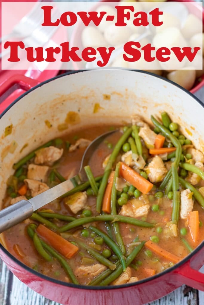 Turkey stew in a casserole pot with a serving spoon. Pin title text overlay at top.