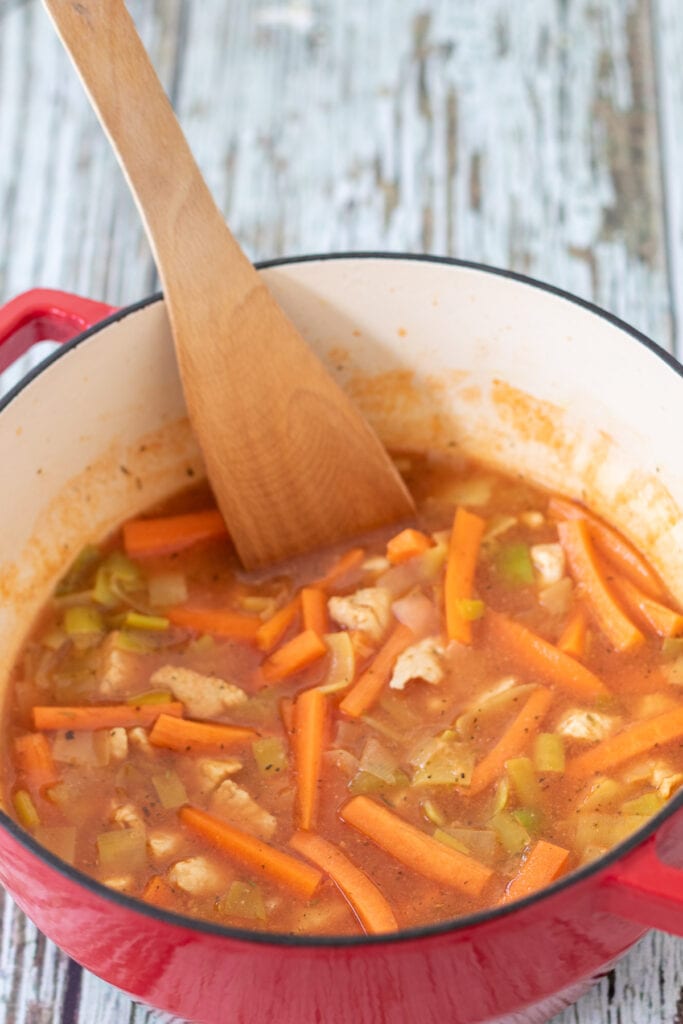 Carrots added into low fat turkey stew.
