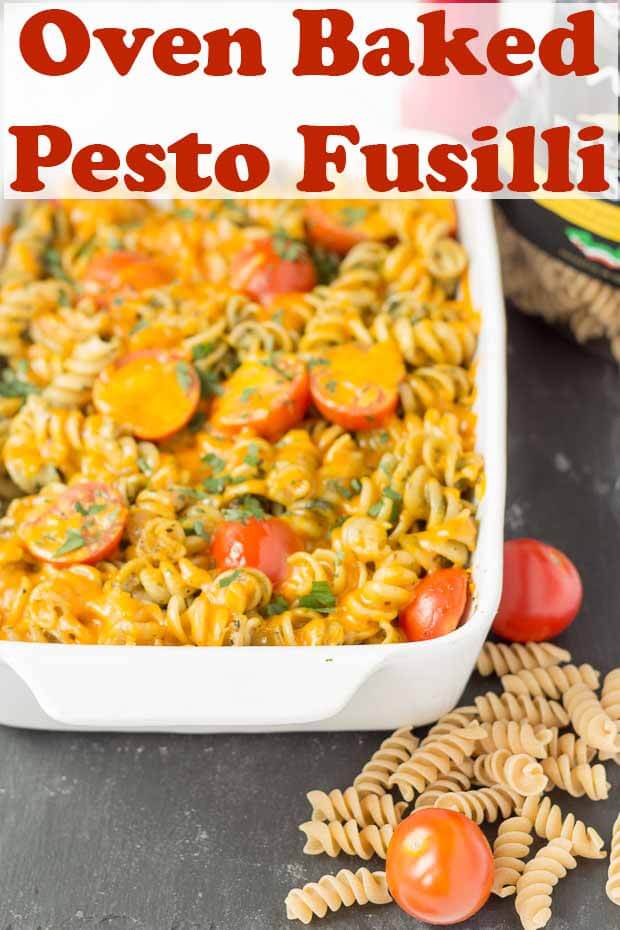 Oven baked whole wheat pesto fusilli is just a perfect recipe if you're looking for a quick healthy meal. It's just an easy simple pesto sauce combined with healthy whole grain pasta and juicy tomatoes to give you a unique taste of the Mediterranean! #neilshealthymeals #recipe #pesto #fusilli