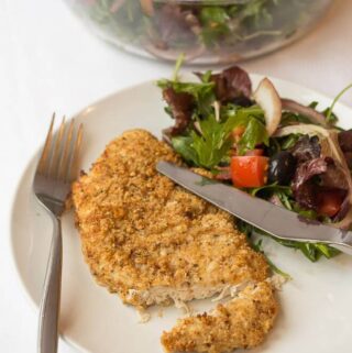 These baked parmesan turkey escalopes are delicious and such a great quick healthy meal to make. A crunchy baked breadcrumb and parmesan crusted turkey breast with a delightful and a simple tomato and rocket side salad all in under an hour. Say goodbye to shop bought and hello to home made!