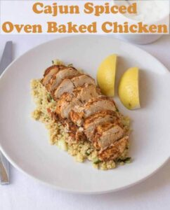 Cajun spiced oven baked chicken is an easy low cost lean and tasty quick healthy meal. This time-saving recipe comes with a delicious bulgur wheat, tomato and cucumber side salad and makes for an excellent lunch or dinner. #neilshealthymeals #recipe #cajun #chicken #ovenbaked
