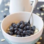 Gluten free and nutty tasting, this vanilla quinoa and blueberry breakfast makes for a delicious healthy alternative to traditional oatmeal. Topped with sweet blueberries, crunchy almonds and just a drizzle of honey, this amazing nutritious breakfast will give you the best possible start to your day!