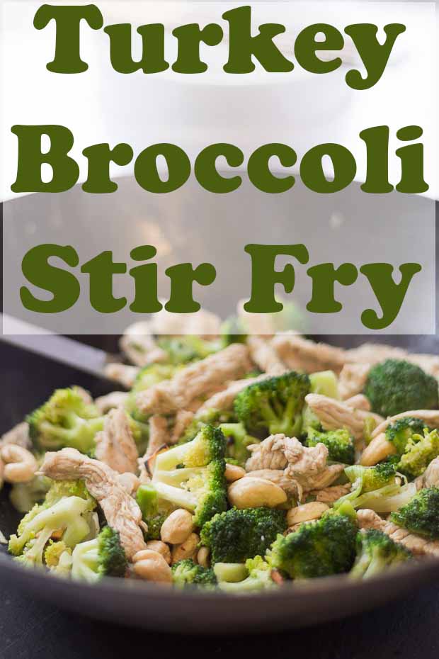 A wok with cooked turkey and broccoli stir fry in. Pin title text overlay at top.