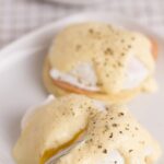 Healthy eggs benedict. Here, the delicious and classic eggs benedict has been given a healthy makeover. A creamy yogurt hollandaise sauce replaces butter with lean turkey bacon and home made lower fat English muffins.