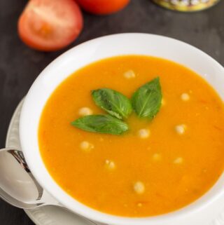 Tomato and chickpea soup is a delicious and simple, comforting and soul-warming recipe. A low cost, budget saving soup. A great recipe that you’ll want to make over and over again!