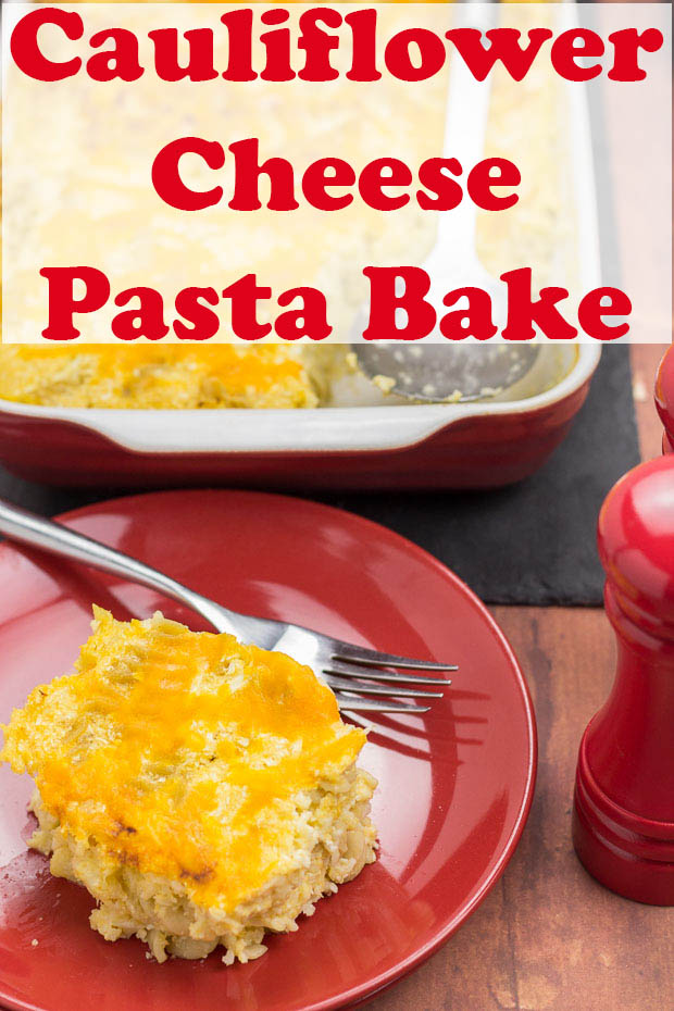 Cauliflower cheese pasta bake served on a plate with a fork ready to eat.