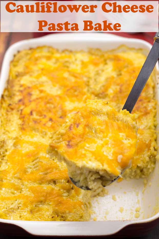 A portion of cauliflower cheese pasta bake being lifted out of a stoneware casserole dish. Pin title text overlay at top.