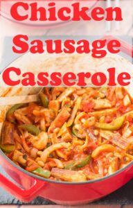 Chicken sausage casserole recipe made in a large casserole pot with a spoon in it ready to serve.