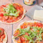 This 30 minutes easy flatbread pizza recipe is just what you're looking for when you're craving a pizza, but not the associated calories! It's quick and easy to make your own flatbread dough base with this recipe, instead of a pizza dough base. No proving is required and the flatbreads are baked in the oven, with your chosen toppings, all in just 30 minutes!