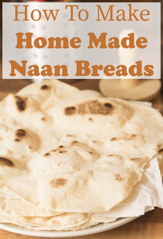 Home Made Naan Breads in a pile on a plate.