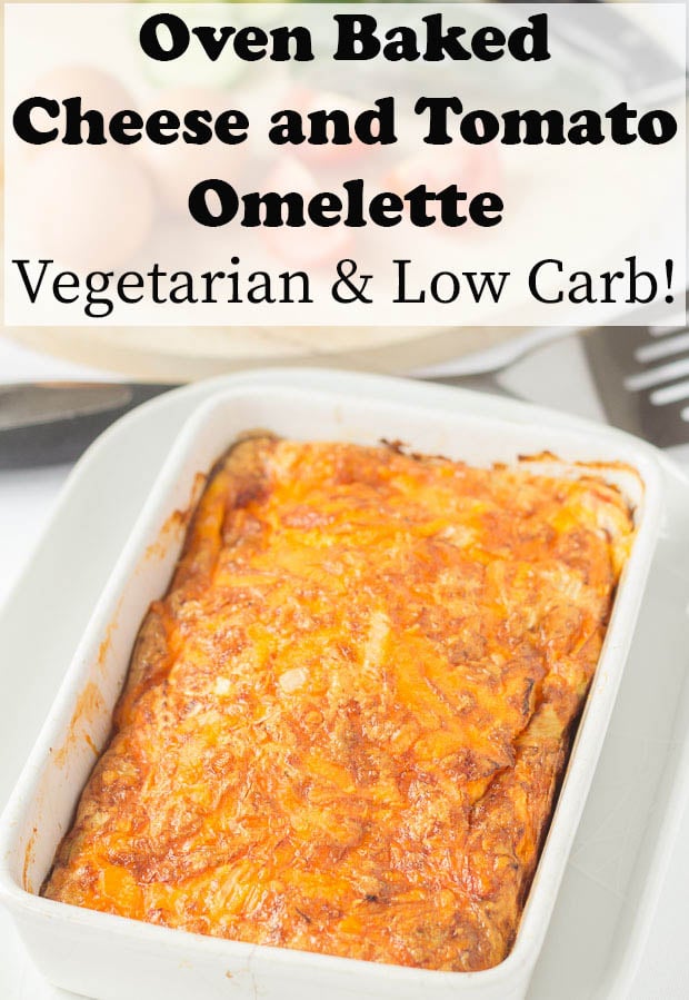 Oven baked cheese and tomato omelette in white baking dish ready to serve.