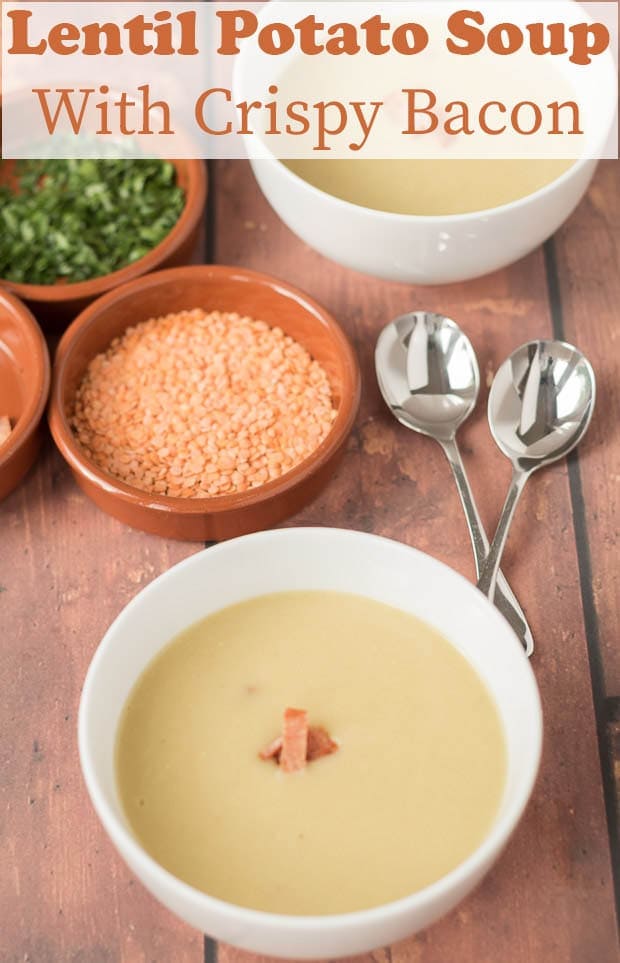 A bowl of lentil and potato soup with crispy bacon surrounded by bowls of lentils and parsley.
