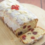 Cherry bakewell loaf cake is an easy and delicious budget cake with all the flavours of a bakewell tart. Topped with a layer of icing sugar it's perfect for sharing with friends.