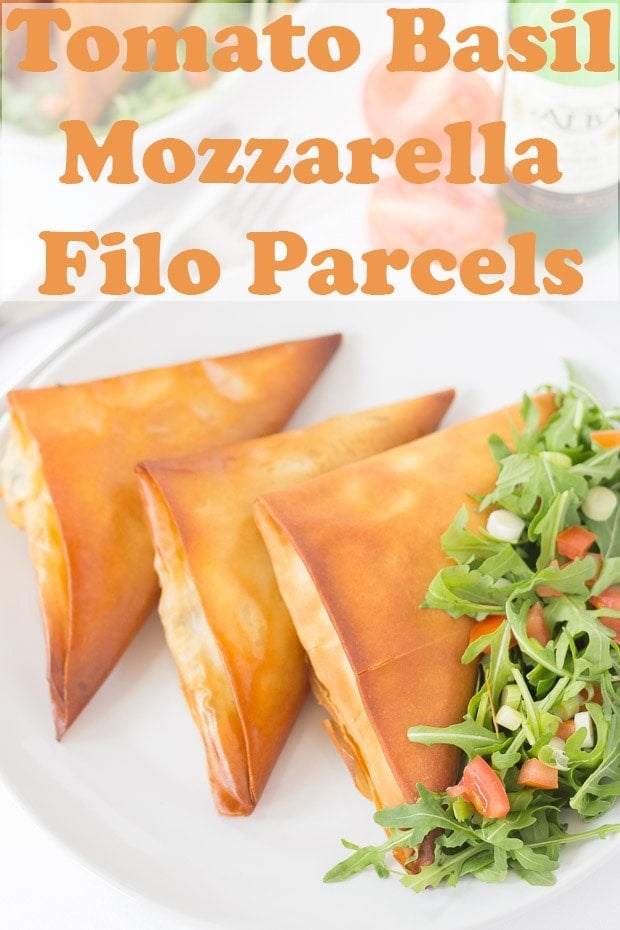 Three tomato basil mozzarella filo parcels on a plate. Pin title text overlay at top.