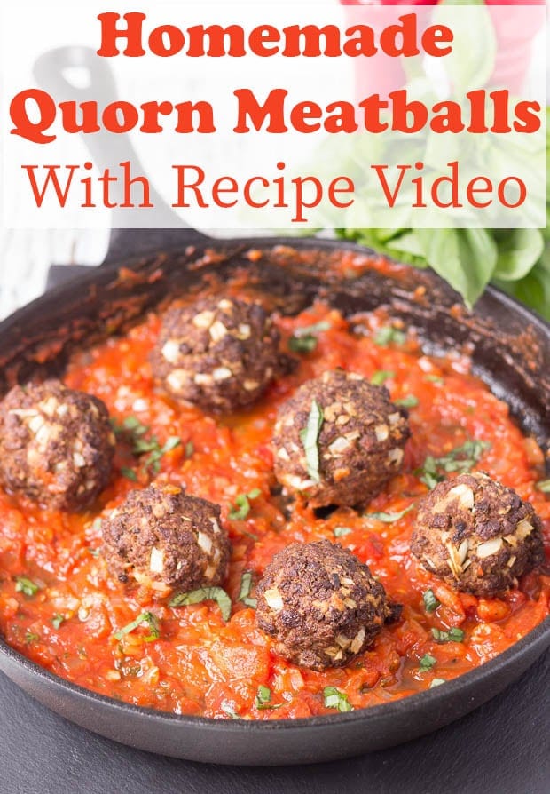 Pan of cooked quorn meatballs in tomato sauce.