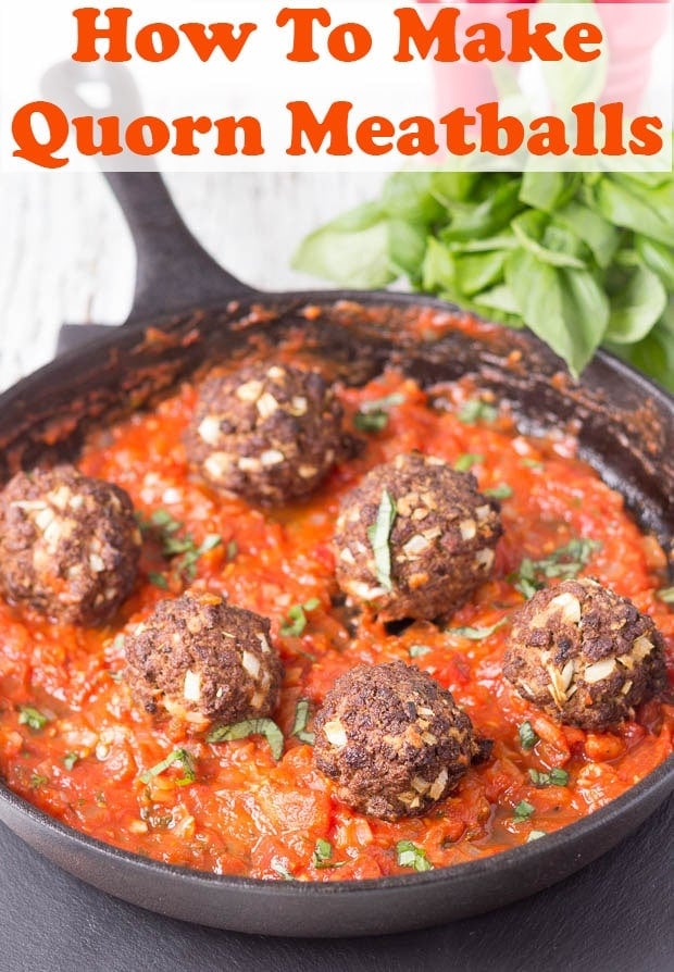 A pan of 6 cooked quorn meatballs in tomato sauce. Pin title text overlay at top.