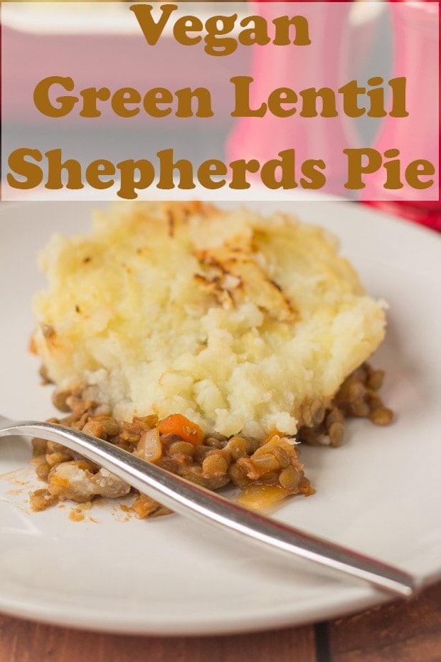 A portion of vegan green lentil shepherds pie served on a plate with a fork to the left hand side. Pin title text overlay at top.