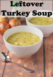 Two bowls of leftover turkey soup. Soup spoon in the foreground. Pin title text overlay at top.