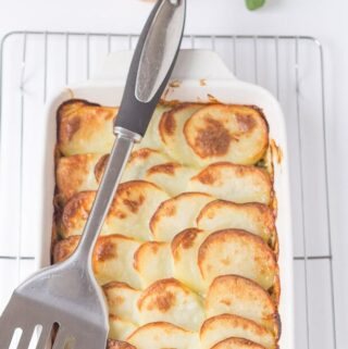 Salmon and spinach potato bake is a simple spinach and potato gratin recipe which is a great meal for family or entertaining friends. This is a delicious healthy recipe to make and any leftovers easily freeze for future dinners too.