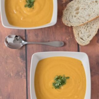 Roasted parsnip and carrot soup is a delicious blend of budget vegetables which combine to produce an amazingly tasty, creamy and gluten free vegan soup. Easy to make and healthy this simple soup is a fantastic winter warmer!