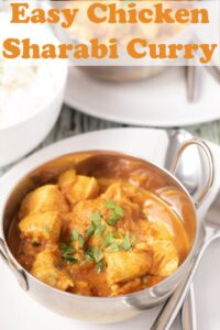 Easy chicken sharabi curry served in a balti dish with a bowl of rice to the side.