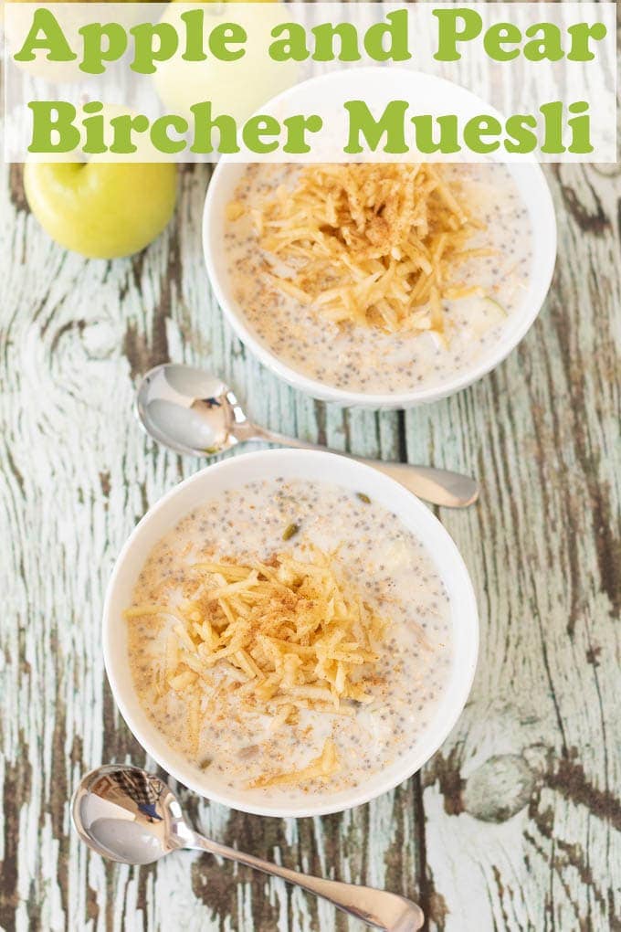Birds eye view of two bowls of healthy apple and pear bircher muesli.