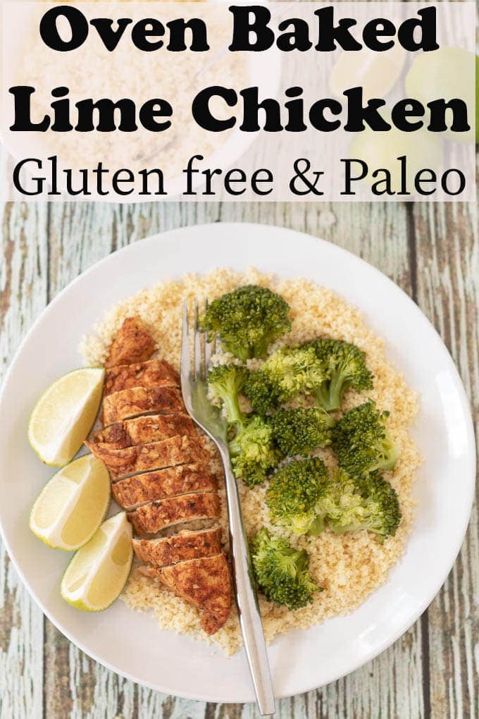 A plate of oven baked lime chicken served on couscous with steamed broccoli and lime wedges to the side.