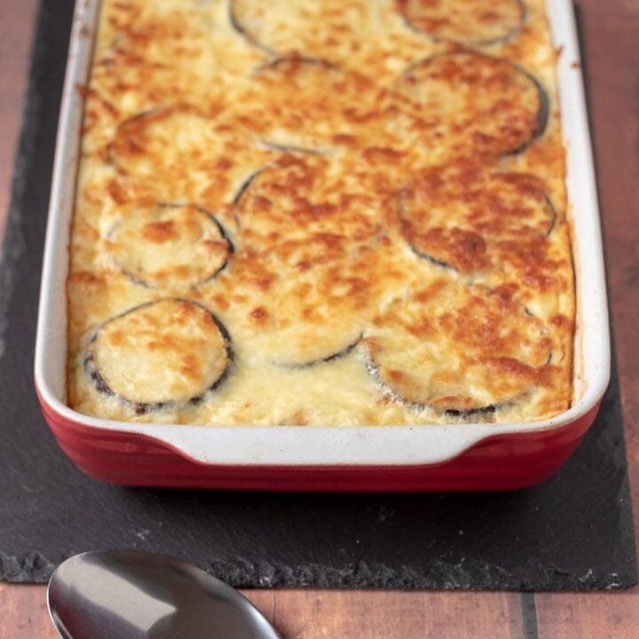Delicious healthier Moussaka just taken out of the oven and cooling before being carved up and served.