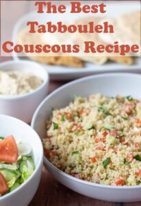 Display of main bowl of tabbouleh couscous with side salad, hummus and at the back a plate of flat breads. Pin title text overlay at top.