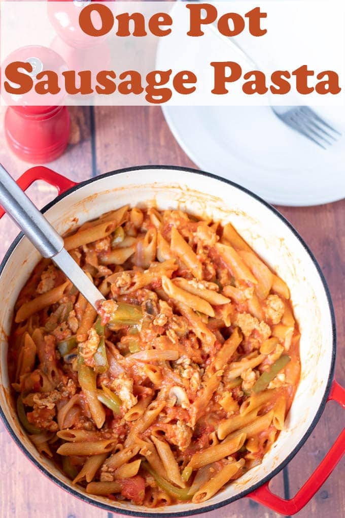 Birds eye view of the one pot sausage pasta with title at top of photograph.