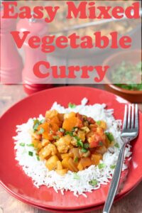A plate of easy mixed vegetable curry served on a bed of rice with a fork to the side. Pin title text overlay at top.
