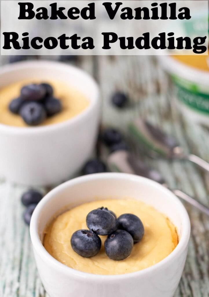Two baked vanilla ricotta pudding ramekins diagonally across from each other topped with blueberries. Pin title at top.