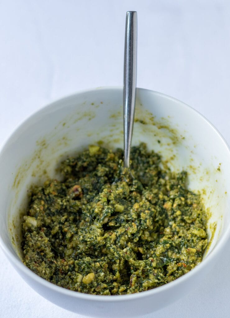 Lemon Juice and parmesan mixed together in a seperate bowl with the basil pesto pulp from the pestle and mortar.