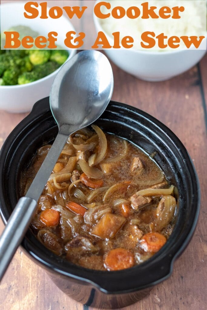 Slow cooker beef and ale stew in slow cooker dish with serving spoon placed over. Pin title text overlay at top.