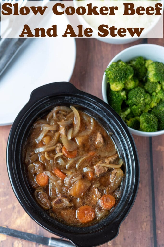 Birds eye view of slow cooker beef and ale stew. With broccoli in a bowl beside. Pin title text overlay at top.