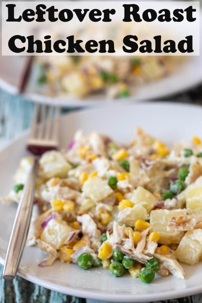 Leftover roast chicken salad served on a plate with a fork to the left hand side. Pin title text overlay at top.