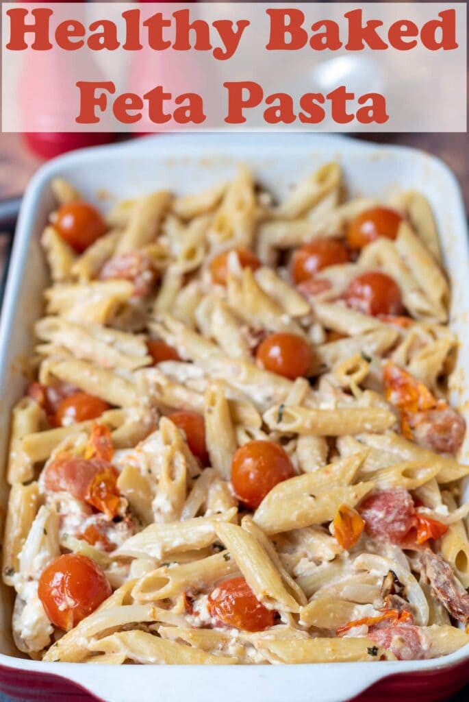 Stoneware casserole dish of healthy baked feta pasta.