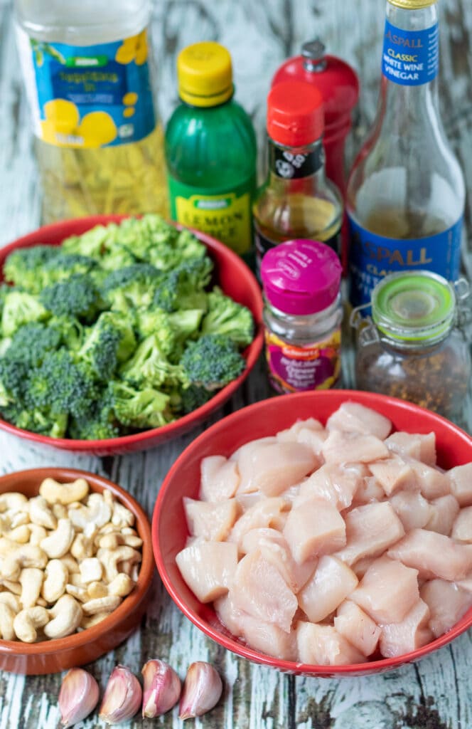 Easy spicy cashew chicken stir fry ingredients laid out on a table.