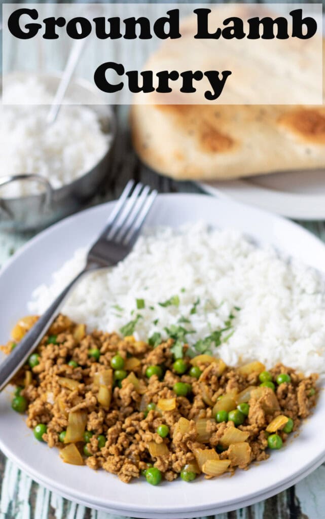 A plate of ground lamb mince curry with basmati rice and garnished with coriander, fork to the left hand side. Naan breads and a balti dish of rice in the background. Pin title text overlay at top.