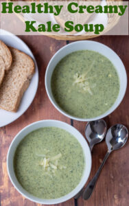 Overhead view of two bowls of healthy creamy kale soup.