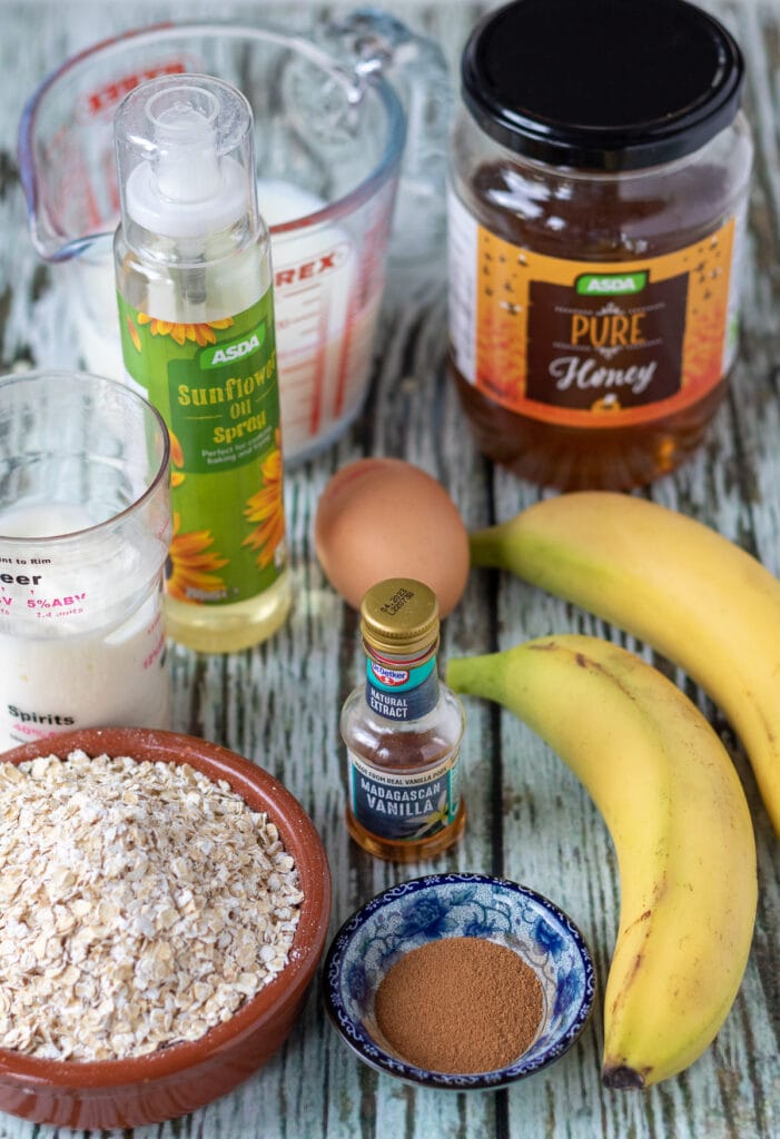 Baked banana oatmeal ingredients laid out on a table.