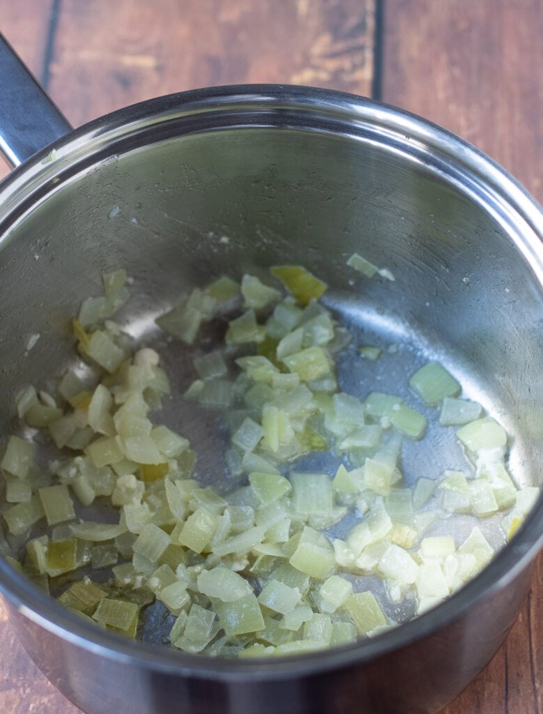 Onion and garlic sautéd in a large saucepan.