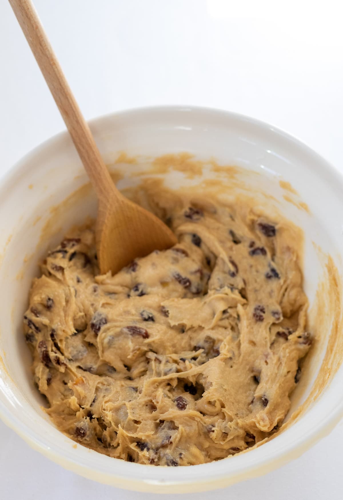 Dried fruit added into cake batter.