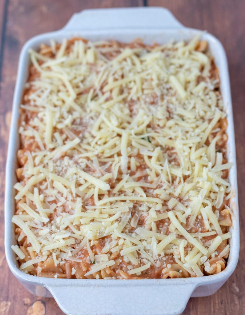 Easy tomato tuna pasta bake in a baking dish ready to go into the oven.