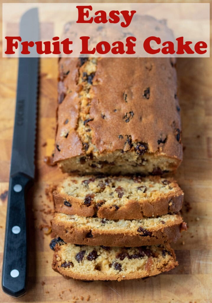 Fruit loaf cake on a cutting board with three slices cut off. Knife to the left hand side. Pin title text overlay at top.
