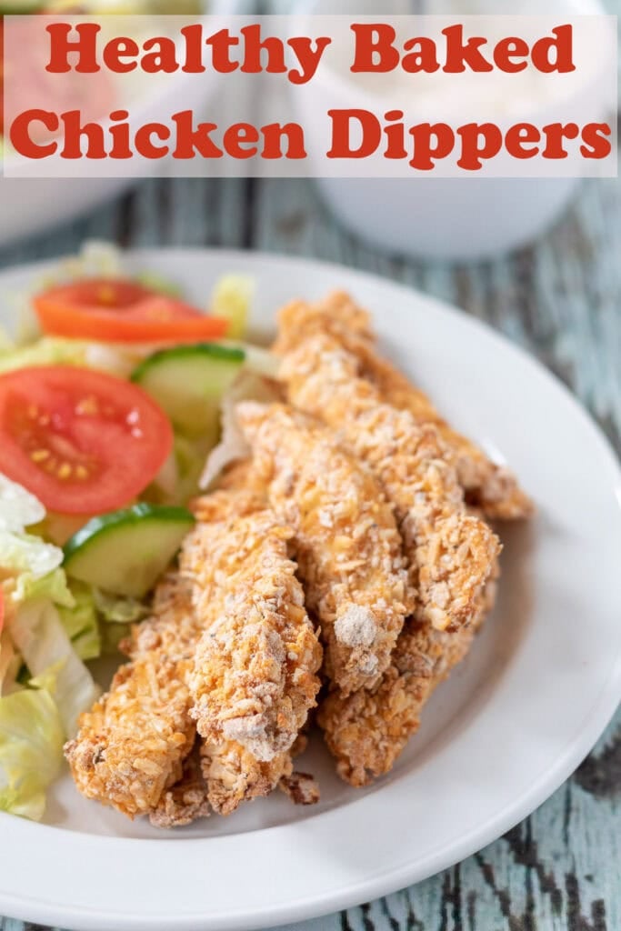 A plate of salad and healthy baked chicken strips. Pin title text overlay at top.